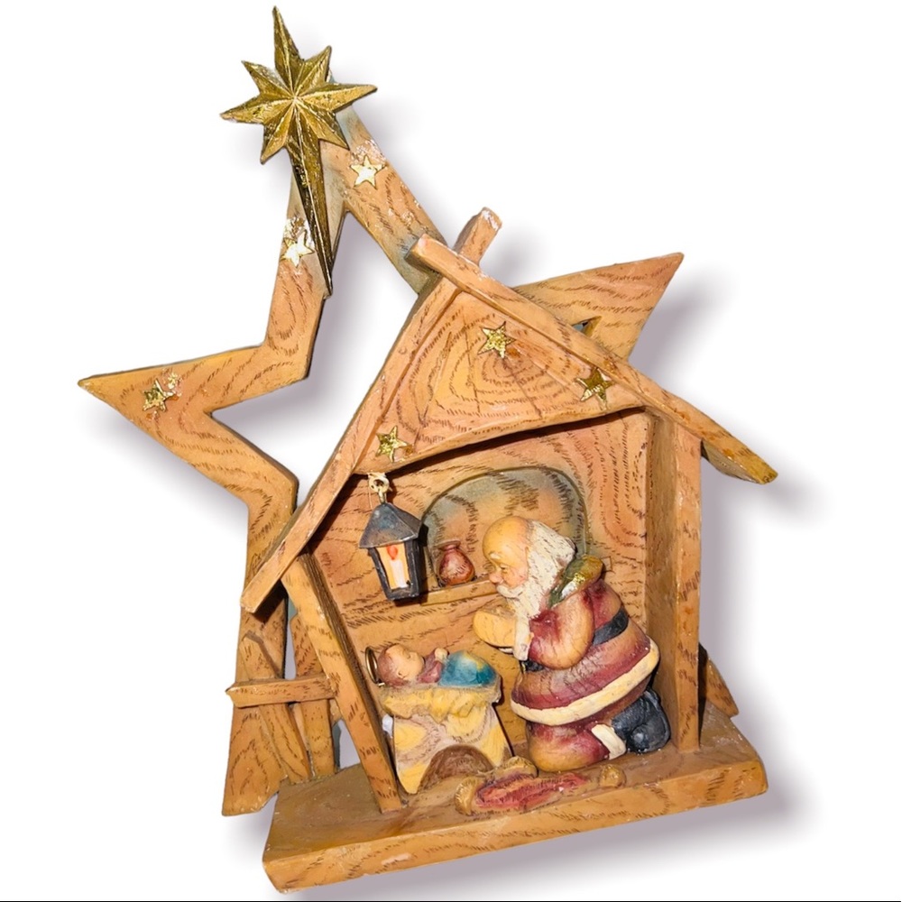 Santa Claus and baby jesus statue